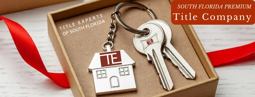 Title Experts of South Florida branded house keychain with new-home keys in a gift box
