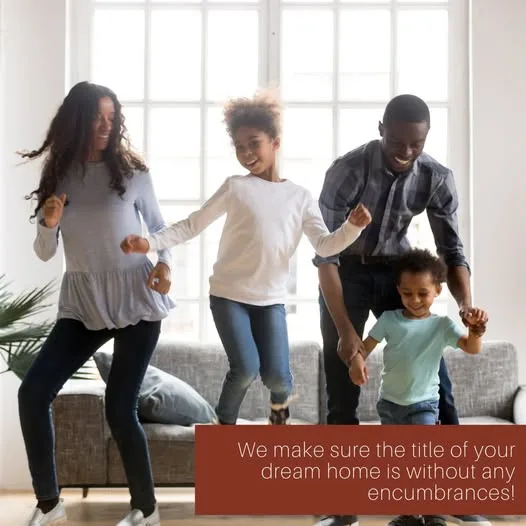 Family dancing in their new living room